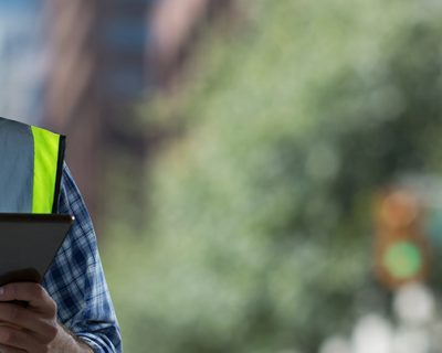 person on tablet for equipment management