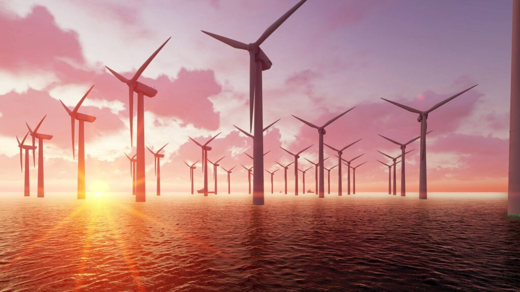 offshore wind turbines at sunset