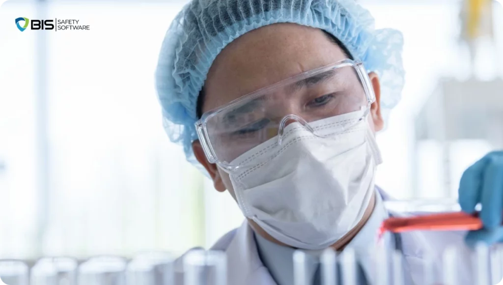 Hazmat professional inspecting chemical samples, emphasizing hands-on knowledge, preparedness, and the critical need to understand the risks of hazardous substances—core values championed by Global Hazmat founder Kevin Swinden.