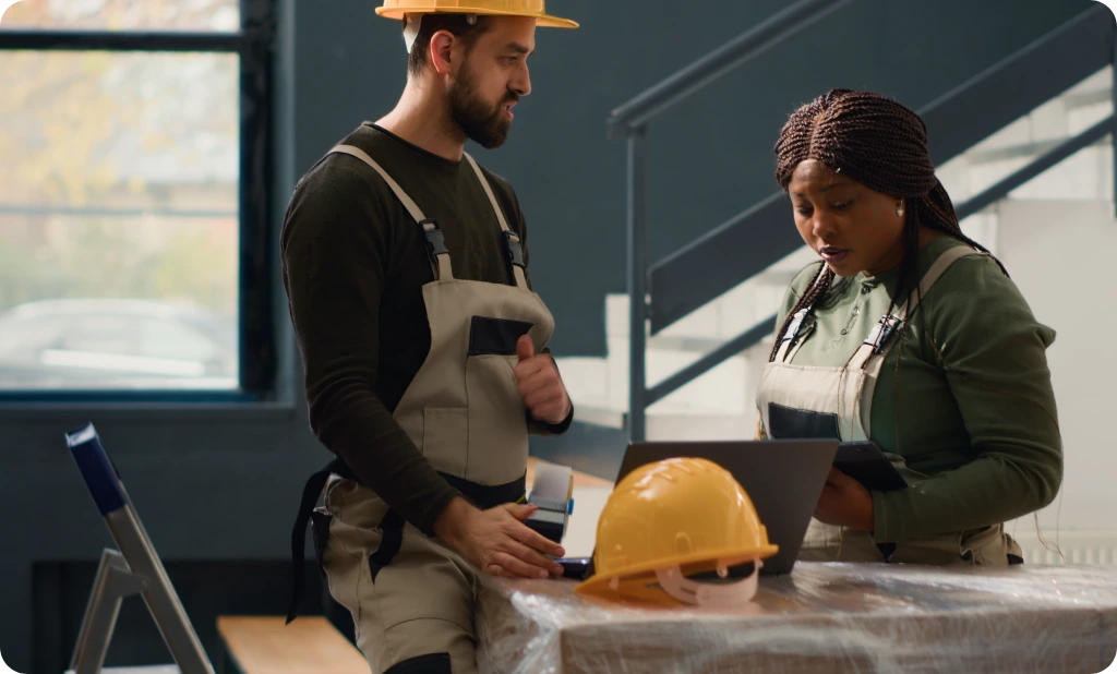 Warehouse coworkers managing inventory